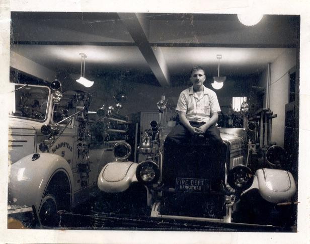 Unknown sitting on 1931 American LaFrance