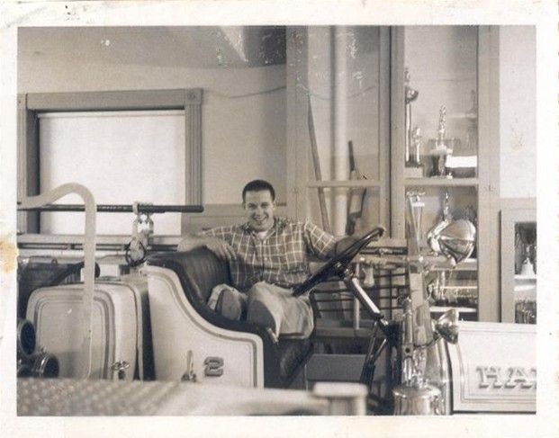 Jay Anderson sitting in the 1931 American LaFrance