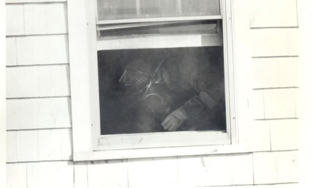 Unknown fireman operating inside @ the Spring Garden Hotel fire.