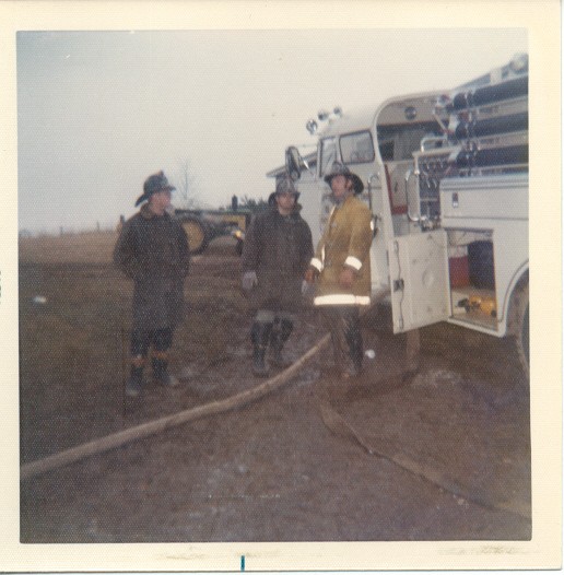 Tim Lare (yellow coat) and unknowns with E-22
