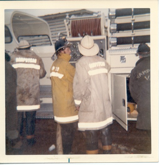 Tim Lare (yellow coat) and unknowns with E-22