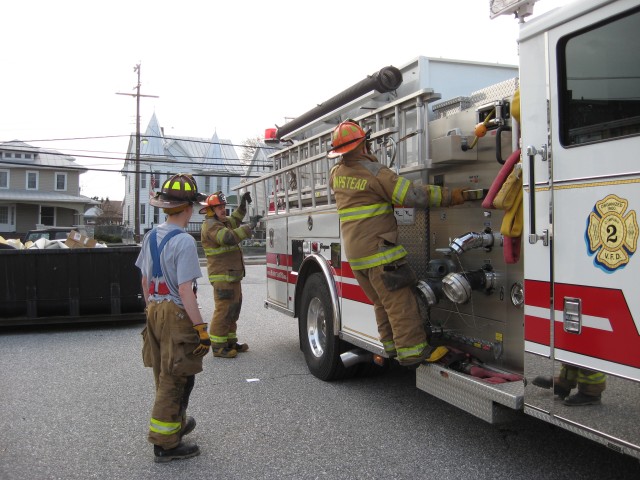 Probie Ladder Training, 04-08-2008.  Removing the ladder from the engine.