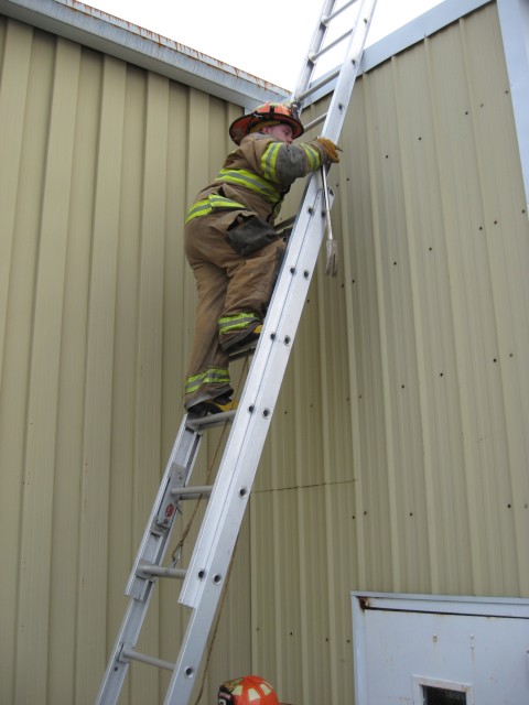 Probie Ladder Training, 04-08-2008.  Carrying a tool up the ladder.