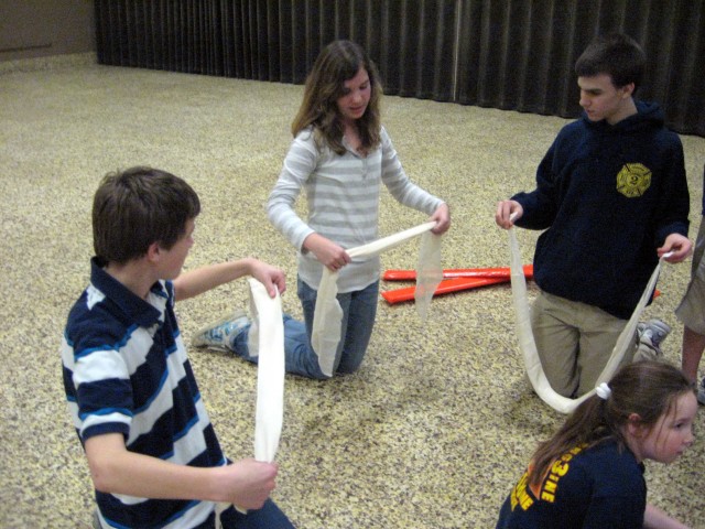 Basic First Aid, 2008.  Folding bandages.