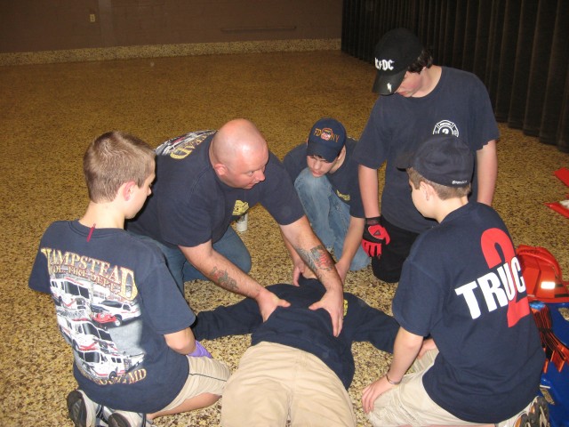 Basic First Aid, 2008.  Either checking for broken ribs or tickling him to see if he's conscious.