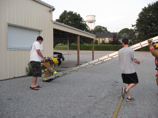 07-17-2008. Firefighter Skills Races - Two man ladder flat raise.