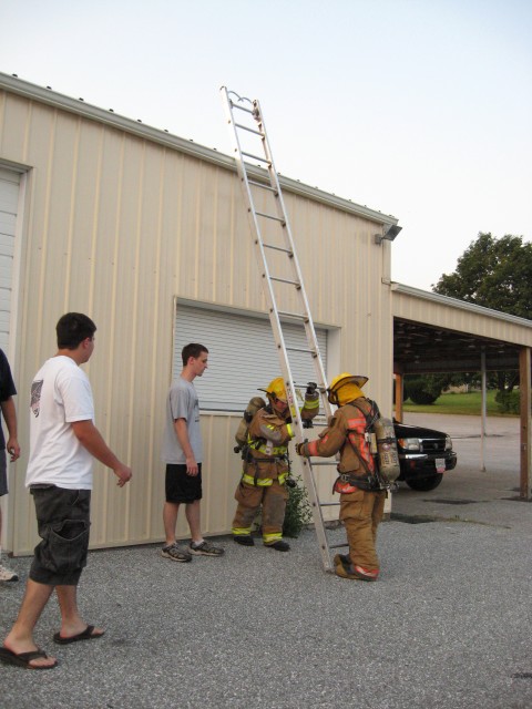 07-17-2008. Firefighter Skills Races - Two man ladder flat raise.