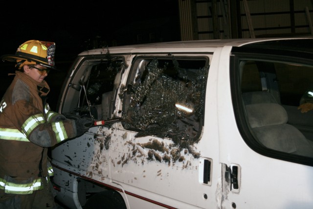 Vehicle Extrication, 2007.  Removing a side window.
