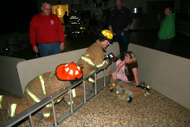 Search and Rescue, 2008. The simulated victim was under the turnout coat in order to make the task of locating her with the thermal imager more difficult.