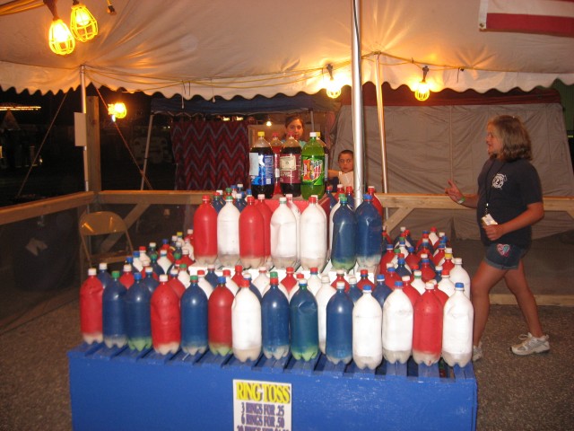 Carnival, 2008, at the Ring Toss Stand.