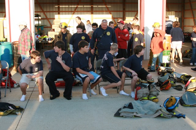 Juniors Day, 09-20-2008. Donning gear race - 1st team relaxing and waiting for the bell.