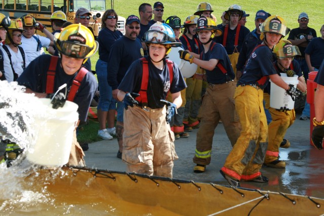 Juniors Day, 09-20-2008.  Scooping water in the Bucket Brigade competition.