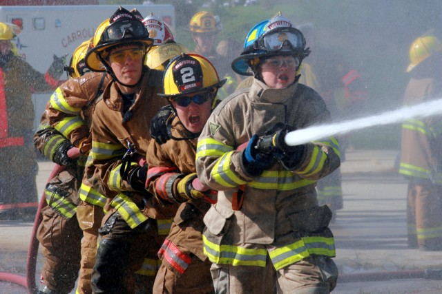 Juniors Day, 09-20-2008.  On the attack in the Opposing Hose Lines competition.