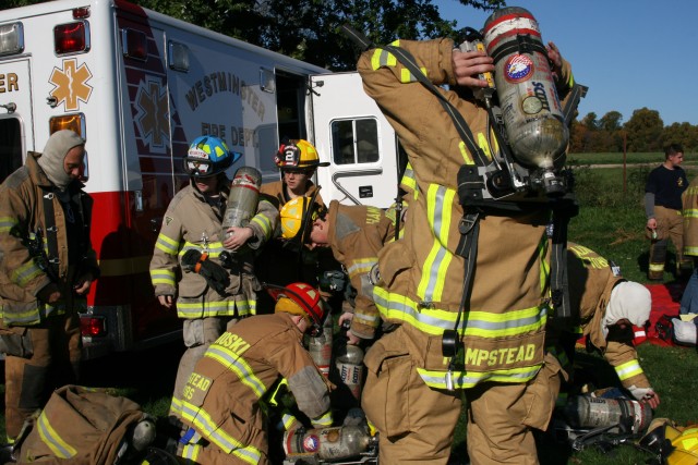 Westminster House Burn Training, 10-19-2008.  Swapping empty air cylinders for full ones.