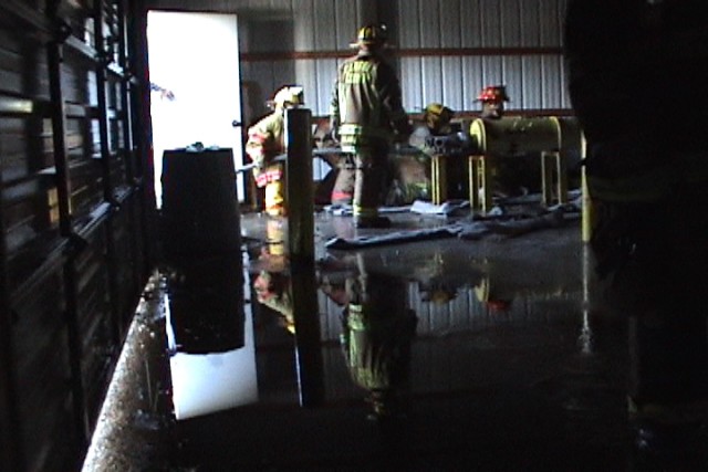 Juniors Day, 09-20-2008.  Primary Search & Rescue training - engine crew advancing towards the fire. 