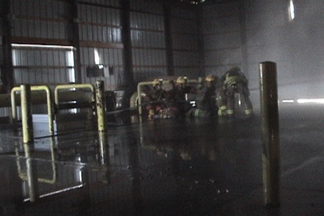 Juniors Day, 09-20-2008.  Primary Search & Rescue training - engine crew attacking the fire.